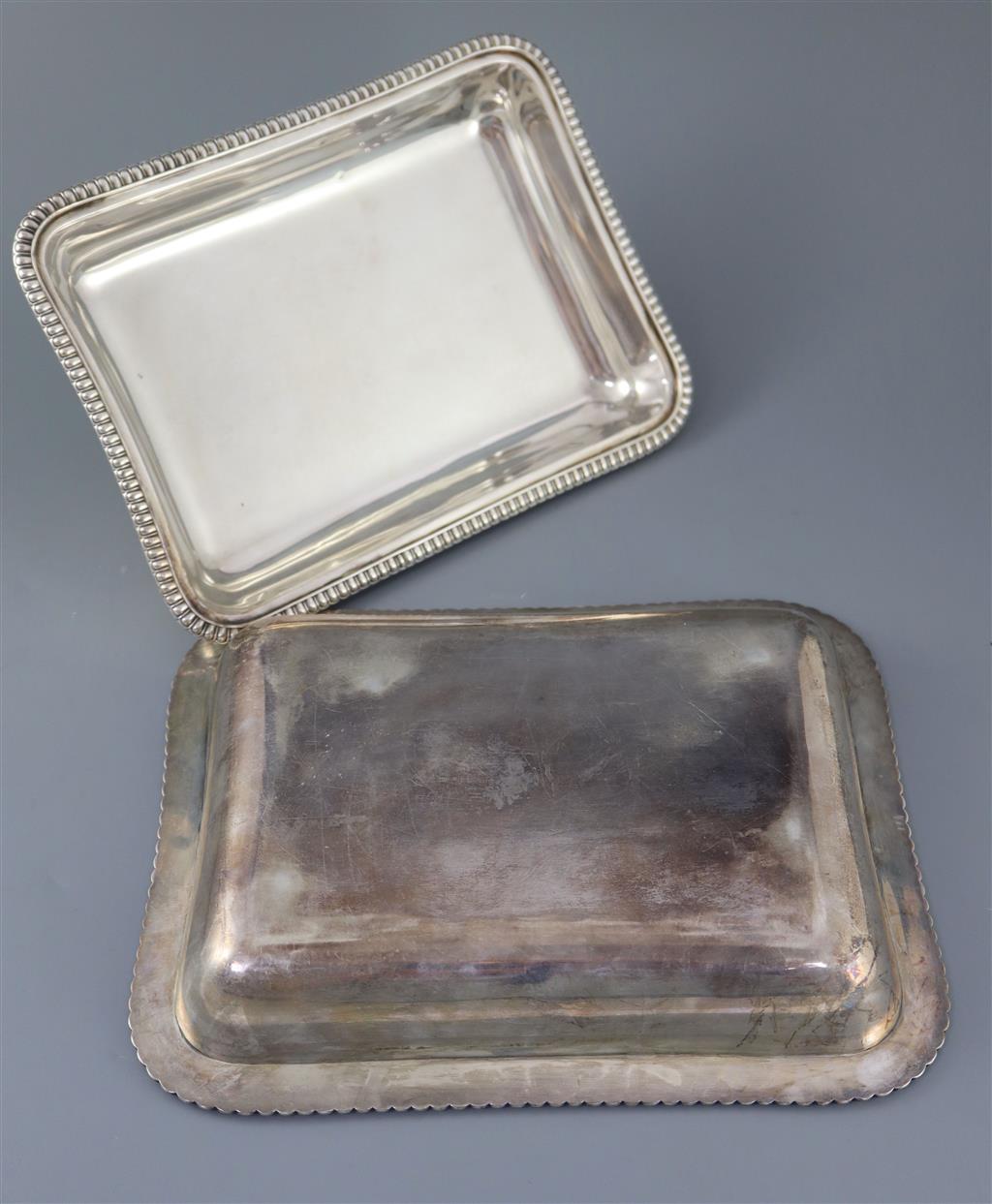 A pair of George IV silver rectangular entree dishes, with covers and handles, by William Bateman,